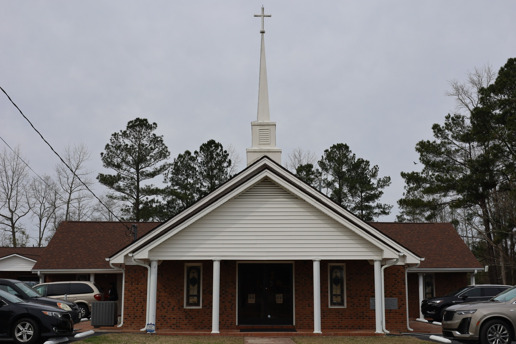 Crystal Spring Missionary Baptist Church, brick building with white portico and steeple