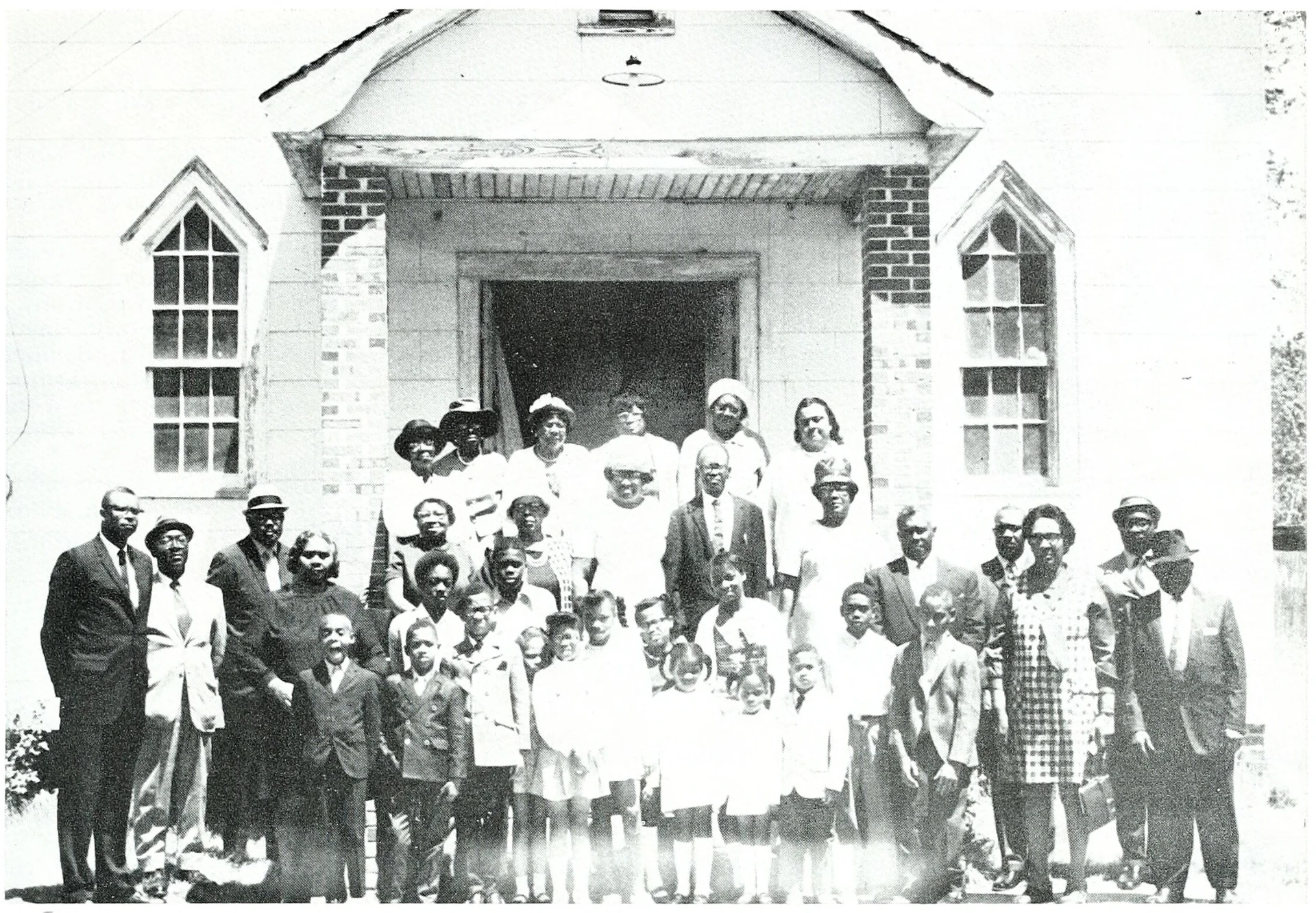 Historic photograph of Spring Green’s congregation gathered outside the church.